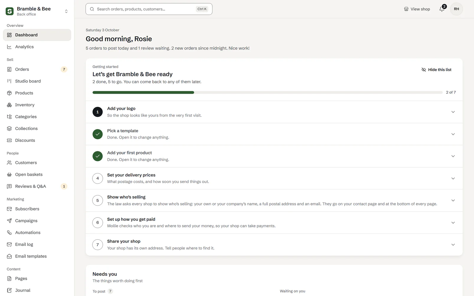 The dashboard’s getting-started list, 2 of 7 done: add your logo, pick a template (done), add your first product (done), set your delivery prices, show who’s selling, set up how you get paid, share your shop